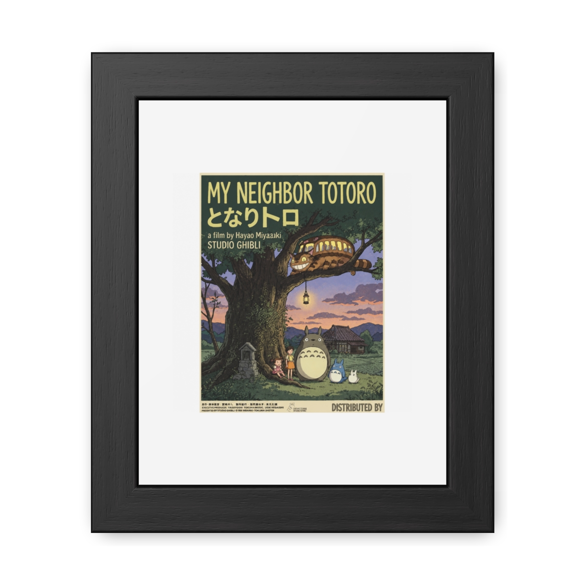 Framed poster for the animated film "My Neighbor Totoro." The artwork features the Totoro character and a bus in a tree, with the film's title in English and Japanese. The poster has a vintage...
